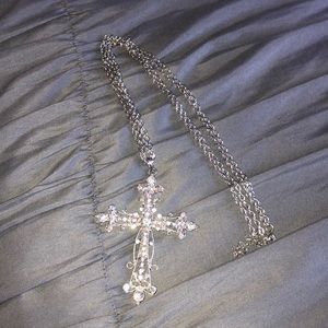 Costume jewelry cross. With double chain.